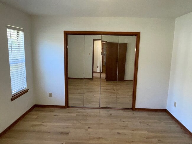 Photo - Welcome home to this charming 2-bedroom, 1-bath residence featuring a warm and inviting layout. E...