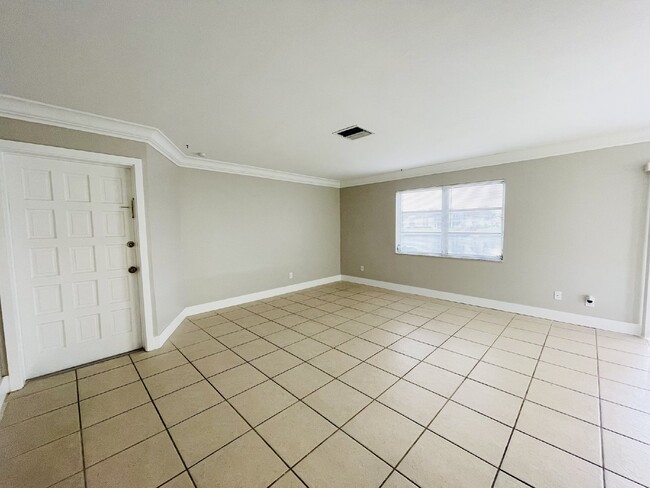 Photo - Updated 2-bedroom waterfront duplex with walk-in closets, enclosed Florida room, and canal views ... Unit B