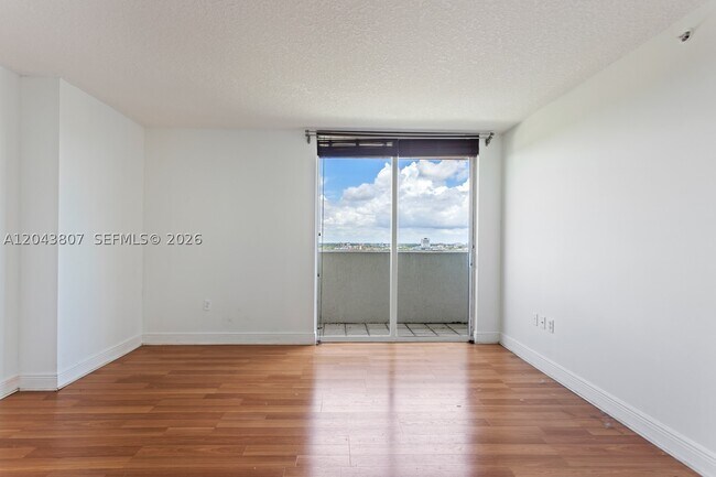 Building Photo - 3000 Coral Wy Unit 1507