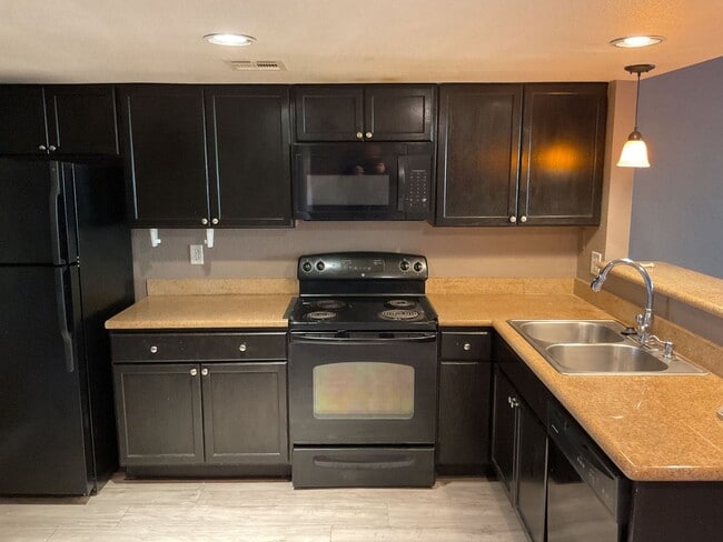 Photo - Charming 2-Bedroom Ground-Floor Gem with M...