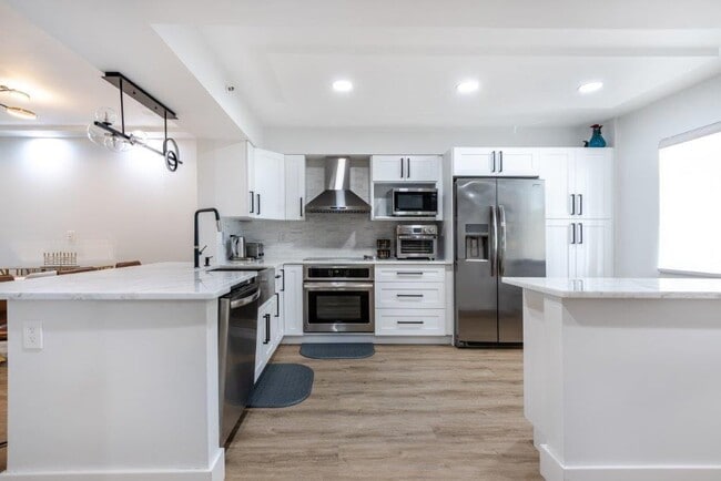 Photo - 6096 Huntwick Terrace Unit 303
