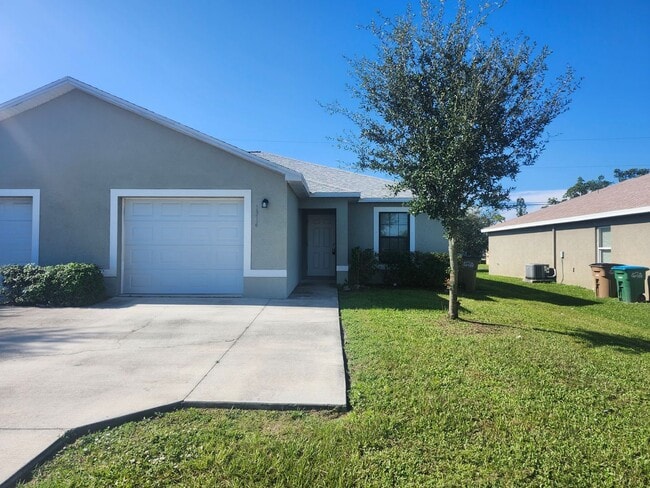 Building Photo - 3 bedroom 2 bath 1 car garage Rental