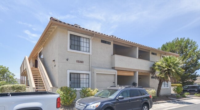 Building Photo - Beautiful Upstairs End Unit Condo In Gated Community!