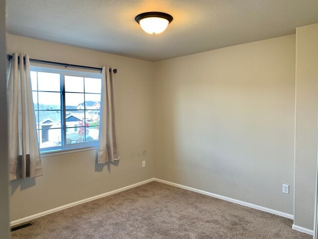 Photo - Beautiful 4 Bed/3 Bath West Greeley Home – Spacious Lot & Great Location!