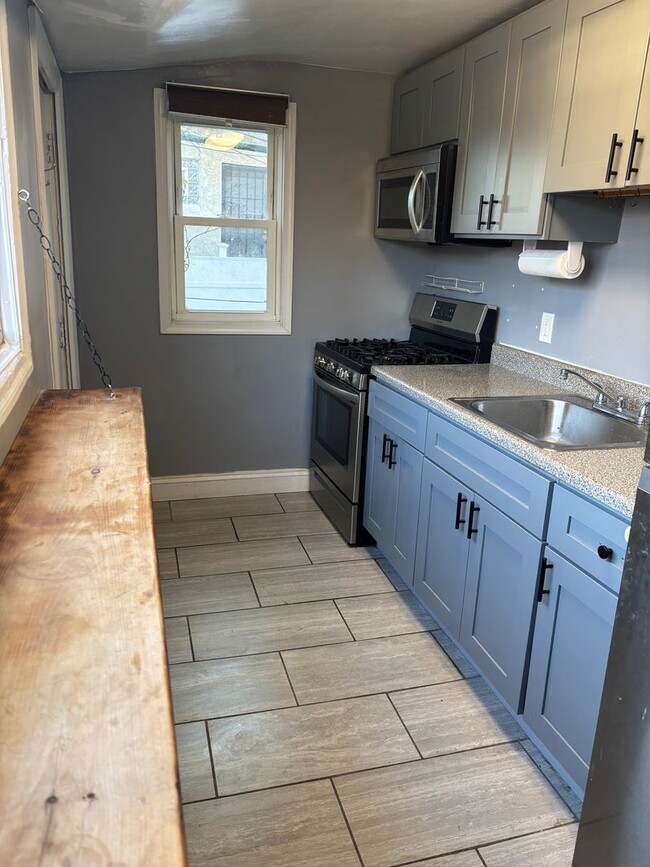 Photo - Beautifully Upgraded 2BR/2BA with Modern Finishes & Private Outdoor Space