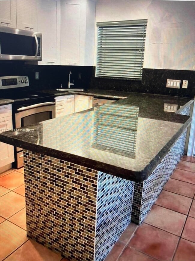 Photo - 1174 NW 13th St Unit 236b