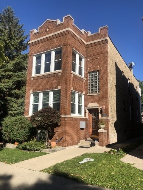 Building Photo - 4047 N Long Ave Unit 1