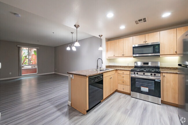 1BR, 1BA - 762SF - Kitchen/Living Room - Metro 102 Apartments