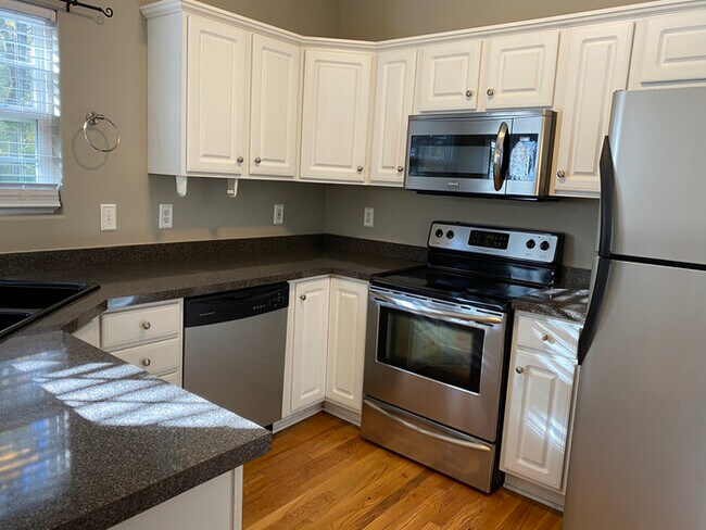 Photo - Ridge Crest subdivision home with fenced y...