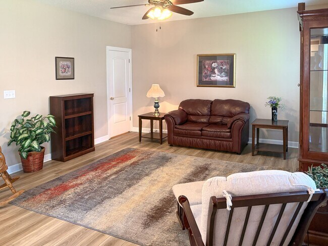 Photo - Fully Furnished 4-Bedroom Home with a Stocked Kitchen, Fenced Yard, and 2-Car Garage