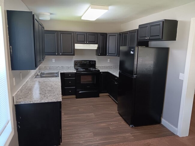 Photo - 4 Bed / 2 Full Bath House with Attached Garage — Brand-New Appliances - Built 2006