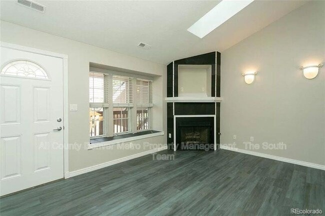 Building Photo - 9617 W Chatfield Ave Unit E