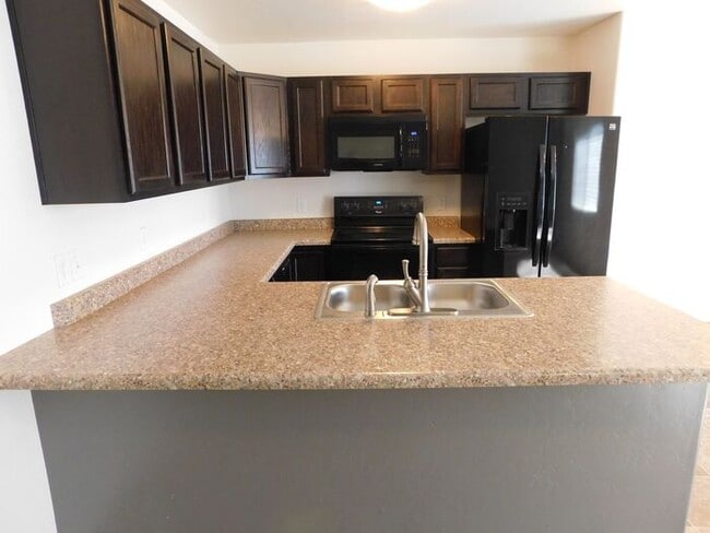 Photo - Spacious 3-Bedroom Condo with Garage – Great Location!