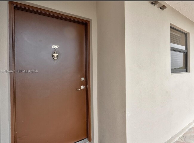 Building Photo - 10155 NW 9th St Cir Unit 4-401