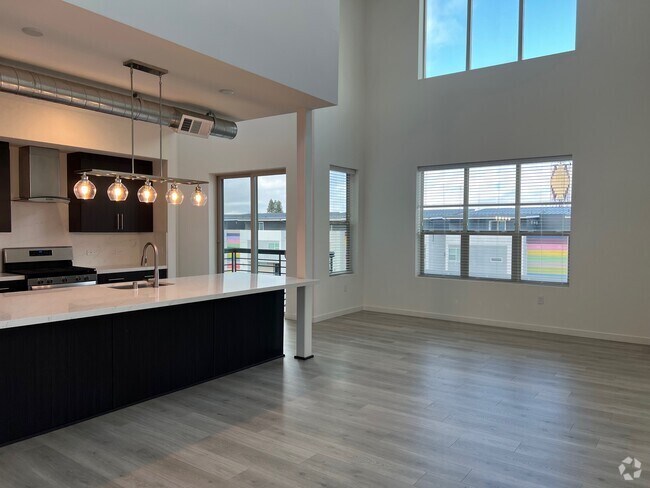 Building Photo - The Flats at the Mill at Broadway Rental