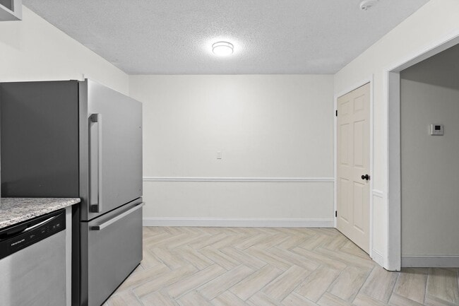 Photo - Updated Two-Bedroom Condo with New Kitchen Appliances and Private Patio