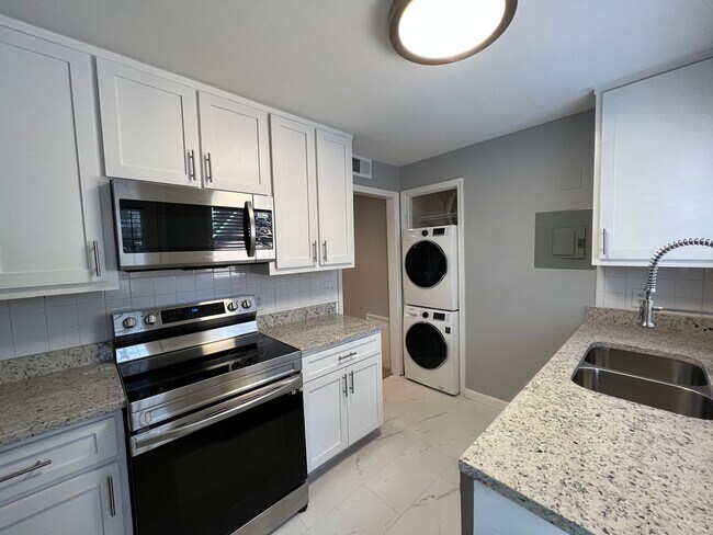 Building Photo - Pharr Court Condos Unit G2