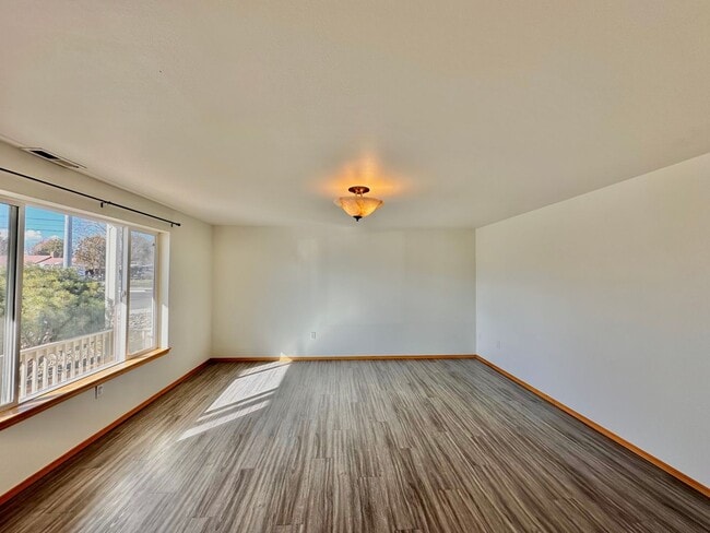 Photo - 4 Bedroom 3 Bathroom Home with Attached Garage, AC, and 2 Separate Living Areas!