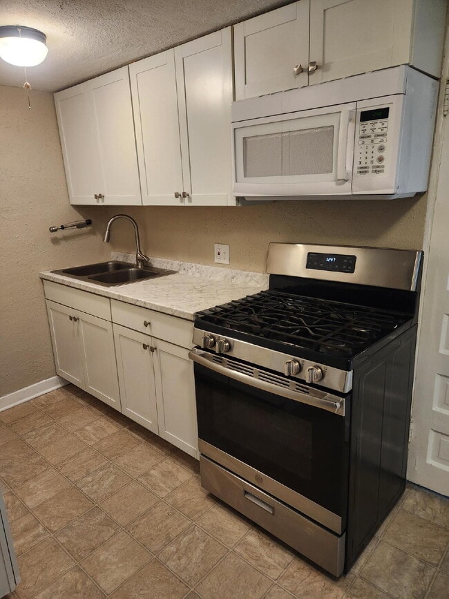 Photo - Charming 1-Bed 1-Bath Wheatridge Duplex with Private Fenced Yard & Garage - Available Now!