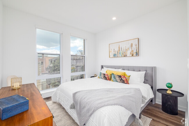 1BR, 1BA - 709SF - Primary Bedroom - The Rail at Bound Brook