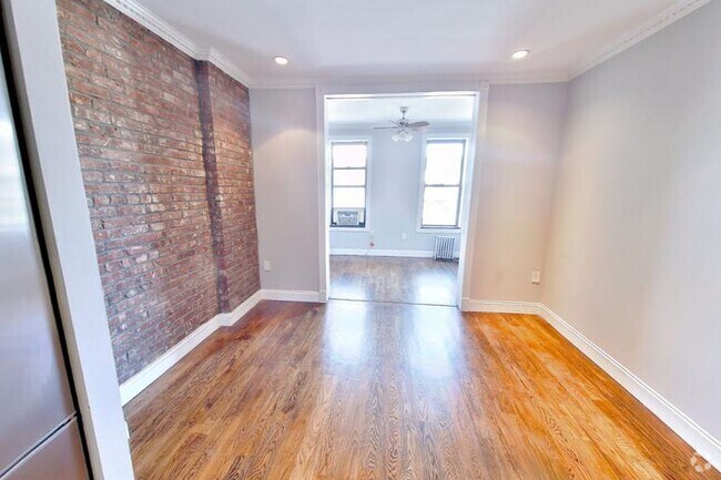 Building Photo - 722 Tenth Avenue (49th & 50th St), #4D Rental