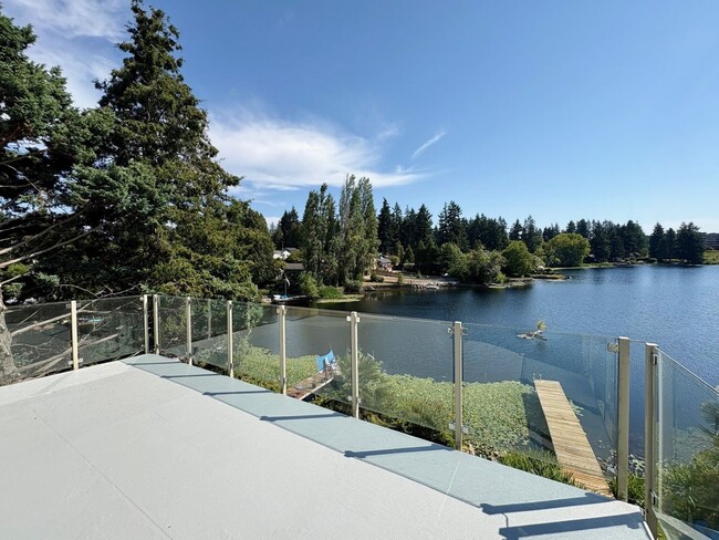 Building Photo - Greenwood Penthouse Apartment Unit PH