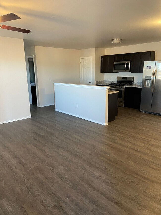 Photo - *Pre-Leasing* Three Bedroom | Two Bath Townhome in Redstone Ranch with Full Service Lawncare