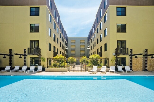 Check out our temperature controlled lap pool and spa with tanning ledge - The Uptown