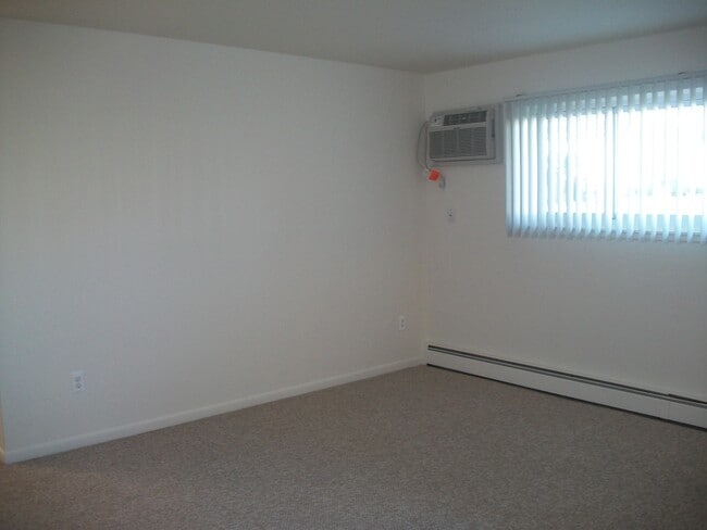 1-Bedroom Living Room - Village Square Apartments