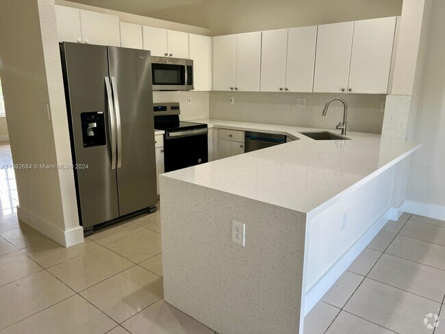 Building Photo - 6940 NW 179th St Unit 302-7 Rental