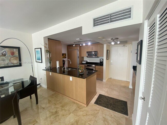 10275 Collins Ave Unit 215