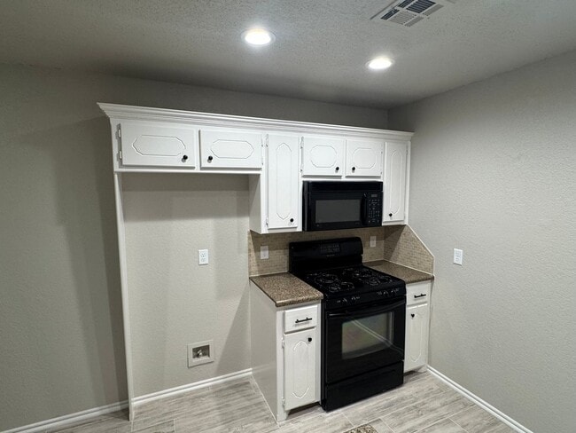 Photo - Storm Shelter!!! This 3 bed, 2 bath, 2 Car Garage home has new paint, kitchen and bathroom granit...