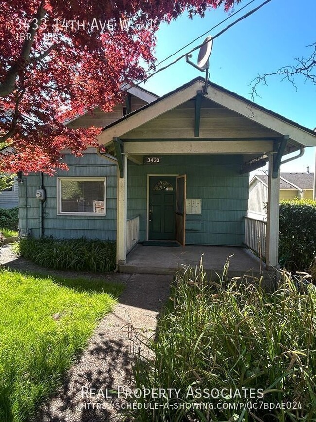 Building Photo - 3433 14th Ave W Unit 1