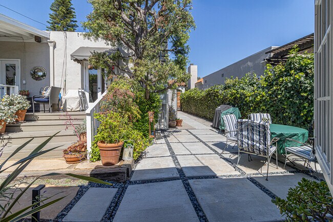 9114 W. 24th driveway leads to guest house - 9116 W 24th St