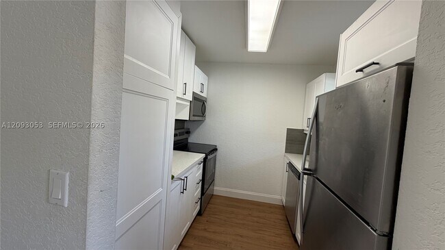 11477 NW 39th Ct Unit 103-1