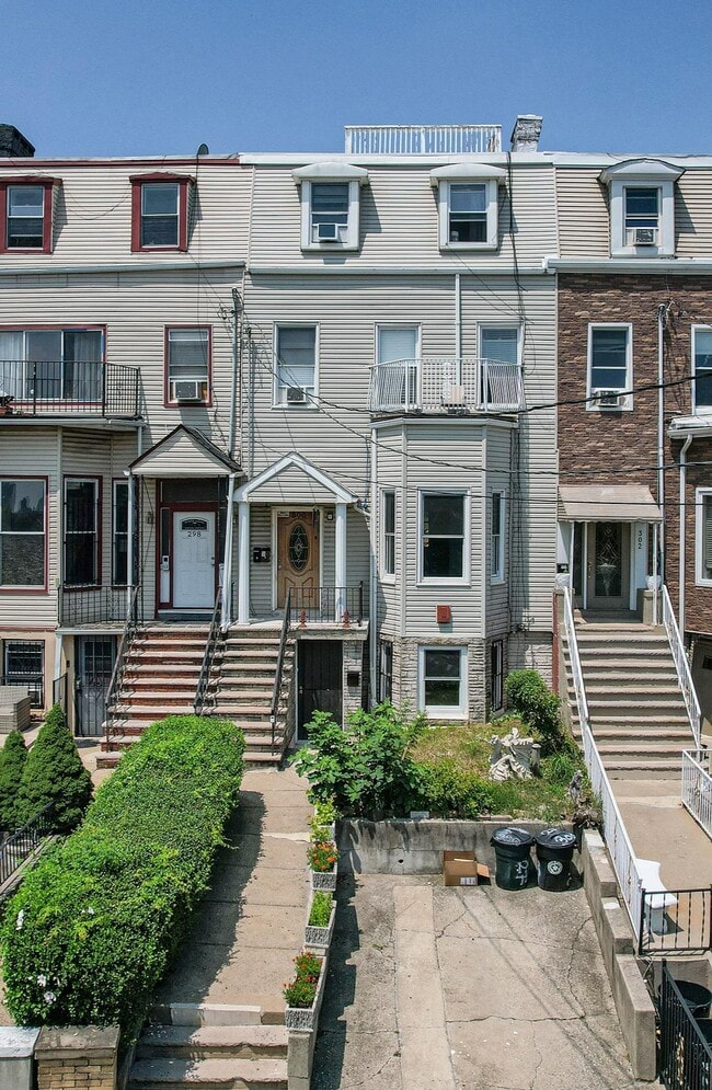 Building Photo - 300 Paterson Plank Rd Unit 1