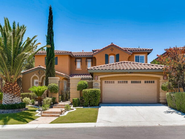 Building Photo - LUXURIOUS UPGRADED HOME IN A GATED SUMMERLIN AREA!!HOUSE HAS POOL AND SPA AND PATIO COVERED BACKY...