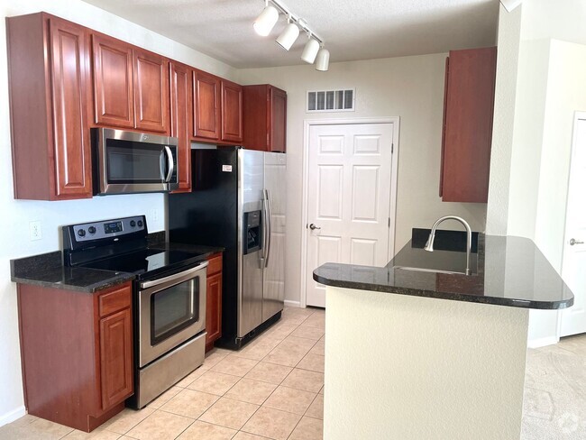 Building Photo - 2 bedroom 1 bath condo for rent in Parker ... Unit 205