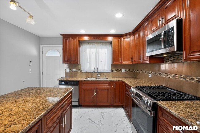 Photo - 7151 Hamlin Ave