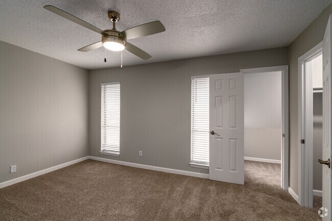 2BR, 1.5BA - 1063SF - Primary Bedroom - Villas de Sendero