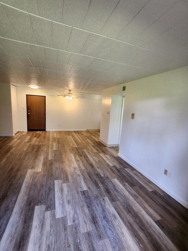Living Area with Flooring - Pebble Creek