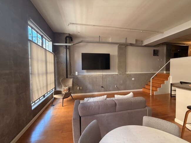 Photo - Industrial-Chic Loft in East Village | 1,049 Sq Ft | Gym & Rooftop