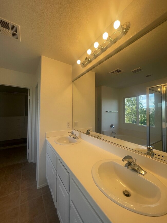 Photo - Hollyhock St