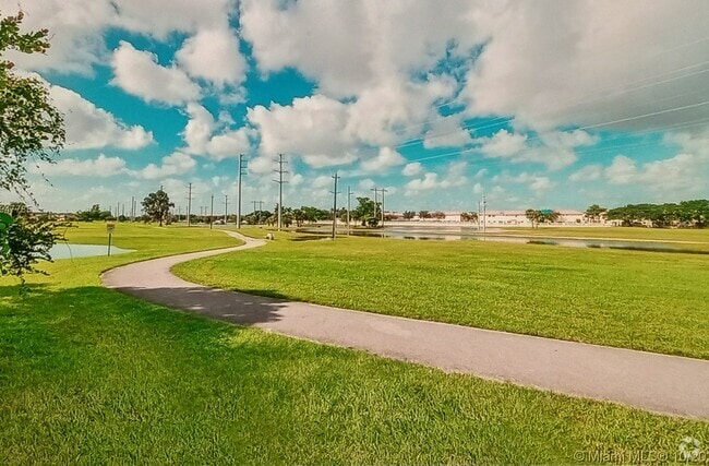 Building Photo - 17800 NW 73rd Ave Unit Country Club Rental