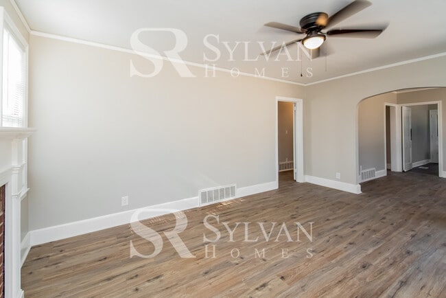 Photo - The living is easy in this 3 bedroom, 2 bathroom brick home