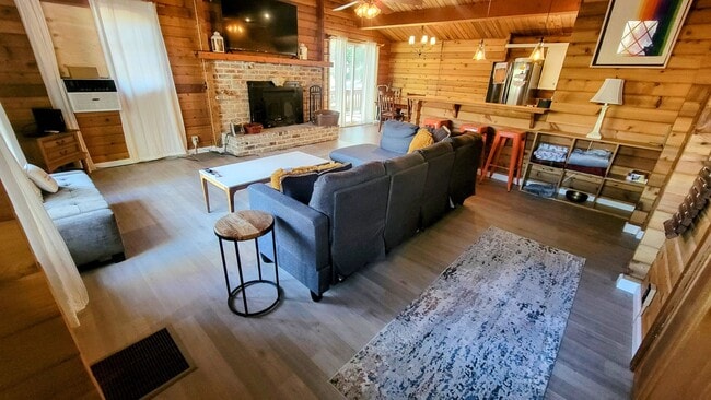 Photo - Move-In Ready 2-Bedroom Log Home with Wrap-Around Deck and Enclosed Yard
