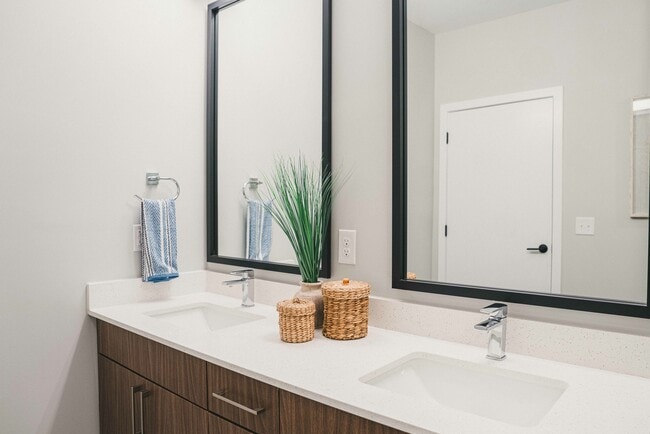 Indulge in luxury living with homes featuring designer bathrooms, complete with double vanities and quartz countertops.