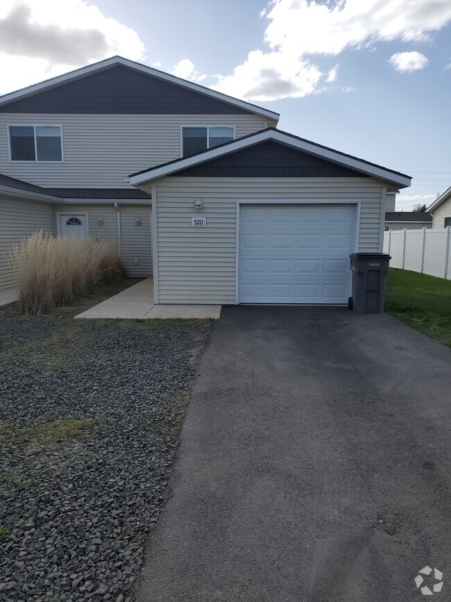 Building Photo - 5209 E Upriver Dr Unit # 5211 Rental
