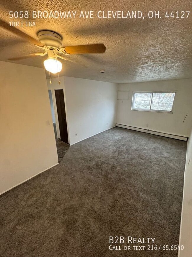 Building Photo - 5058 Broadway Ave Unit 2