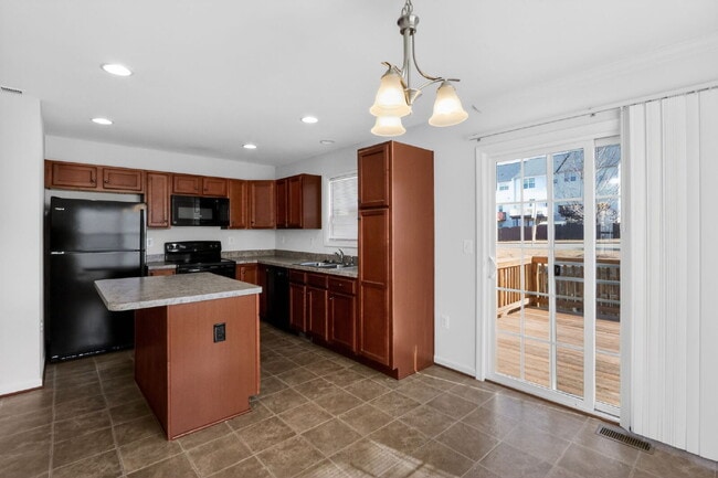 Photo - Welcome to a gorgeous end unit townhouse, located in the Heather Hills community.